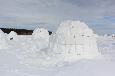 Igloo  standing on a snowy glade  in the winter, Novosibirsk, Russiaの写真素材