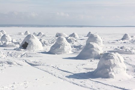 Igloo  standing on a snowy  reservoir in the winter, Novosibirsk, Russia