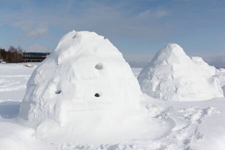 Igloo  standing on a snowy  reservoir in the winter, Novosibirsk, Russiaの写真素材