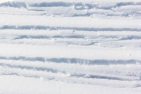 Cracks on the snowy surface of the riverr, Ob reservoir, Novosibirsk, Russiaの写真素材