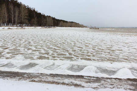 Ice formation on a river in autumn, Ob reservoir, Novosibirsk, Russiaの写真素材