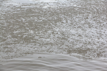Ice formation on a river in autumn, natural background, Ob reservoir, Novosibirsk, Russia
