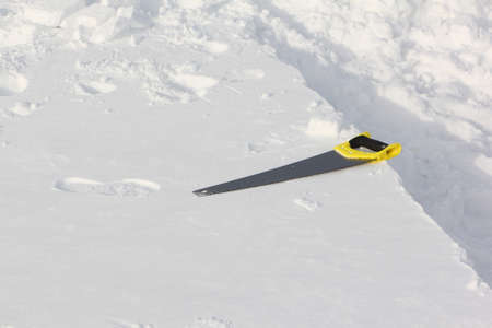 Saw for sawing snow blocks for building an iglooの写真素材