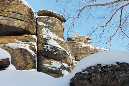 Top of the Tserkovka mountain with an Orthodox cross, Belokurikha city, Altai Territory, Russiaの写真素材