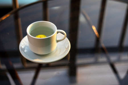 blurry, a cup of drink with lemon in the morning on the balcony in the hotel, with a good mouth, travelの写真素材