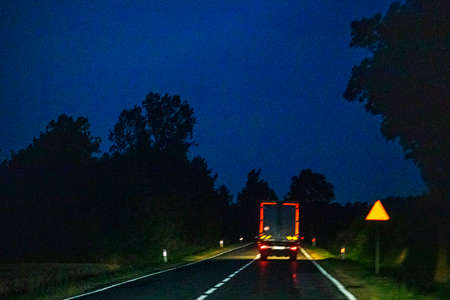poor visibility on a rainy night on a motor road. through the windshieldの写真素材