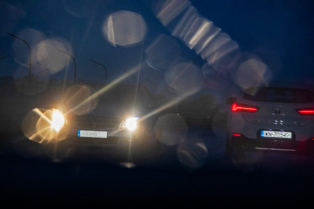 poor visibility on a rainy night on a motor road. through the windshield