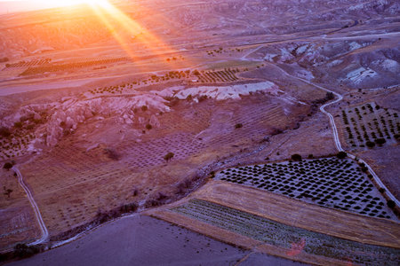 huge hot air balloons with and without flame before flying with bizarre mountain silhouettes in the Cappadocia valley in the early morning.の写真素材