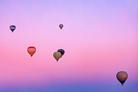 takeoff of a hot air balloon at sunrise in the circumference of Cappadocia, horizontalの写真素材