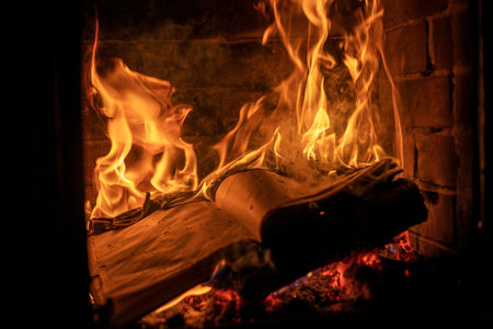 burning notebook weekly in the fireplace, last year, horizontalの写真素材