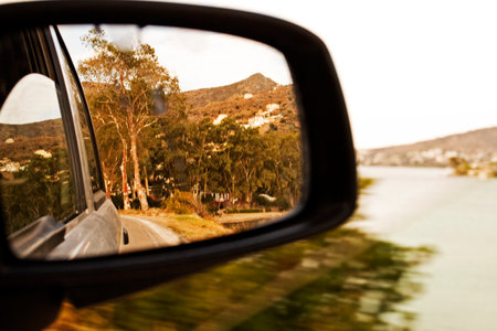 right side mirror in the car near the seaの写真素材