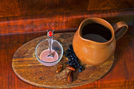 cup of cocoa with a jug and datesの写真素材