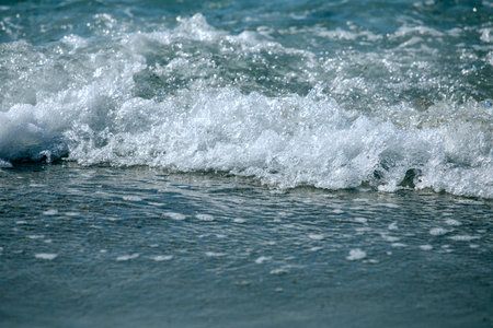 small waves on the aegean sea during the day, in Turkey, resort, foam, off-season, horizontal