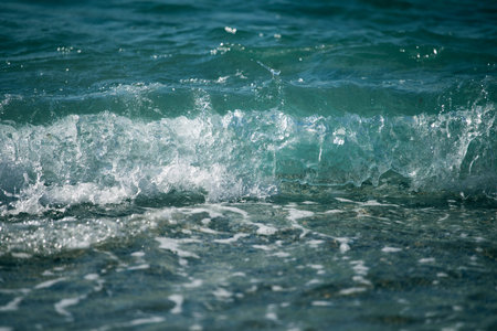 small waves on the aegean sea during the day, in Turkey, resort, foam, off-season, horizontal