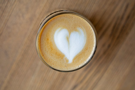 glass cup with hot coffee on the table and frost,の写真素材