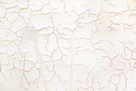 abstract light cracked rubbed faux leather background. horizontal