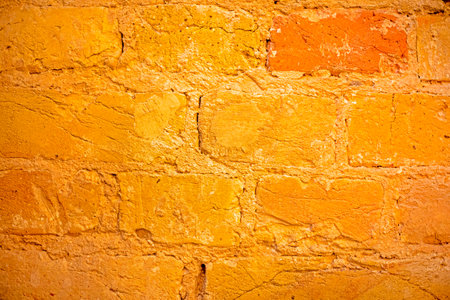 close up abstract natural texture orange brick background of old wall. Stylish interiorの写真素材