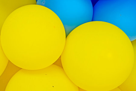 patriotic background of yellow-blue balloons close-up. support for Ukraineの写真素材