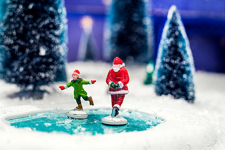 New Year's figures of Isanta Klaus girls skating on iceの写真素材