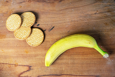 banana next to banana cookies. make banana cookies. Taking care of healthy eatingの写真素材