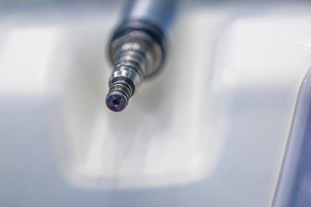 close-up of a dental bur machine attachment. Treatment and restoration of teeth