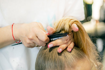 stylist create a fashionable hairstyle. Ballroom sports danceの写真素材