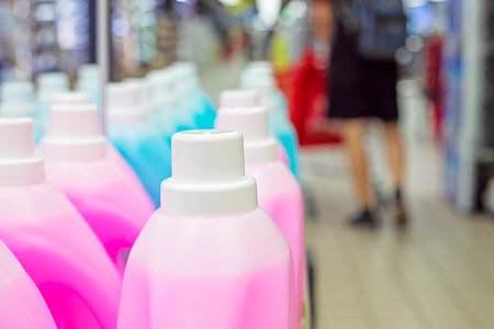 plastic containers with a chemical solution for cleaning, washing floors, cars and other household items in the supermarketの写真素材