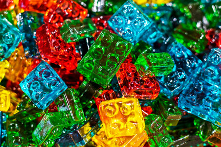 background of jelly colored candies in the shape of Lego cubes. Children's holiday party