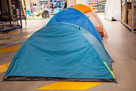 folding camping tents for camping tourism family vacation in a sports supermarket
