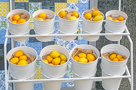 fresh lemons in decorative buckets on the counter in the supermarket. Vitamin Cの写真素材