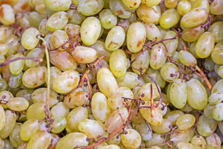 background of white ripe juicy grapes