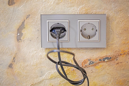 modern sockets in the interior on a concrete wallの写真素材