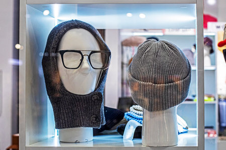 mannequin in stylish glasses and a fashionable knitted hat. fashion and styleの写真素材