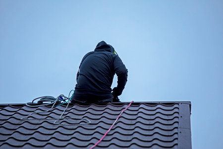 installation of solar panels on the roof. Saving energy resources of the earthの写真素材