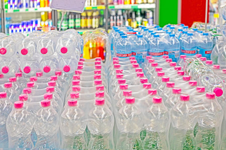 purified drinking water in bottles in the supermarket. Health care