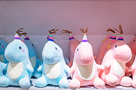 funny pink and blue soft toy unicornsの写真素材