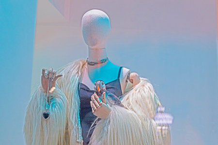 stylish women's fur coat on a mannequin