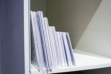 white canvases of different sizes for painting on a rack. Education and hobbies. Art therapy
