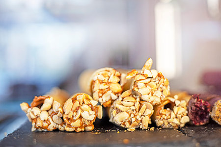 appetizing sweet wafer rolls with peanuts