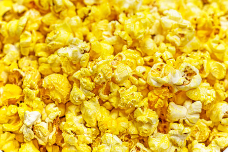 eating popcorn in the cinema before watching a movie. family weekend