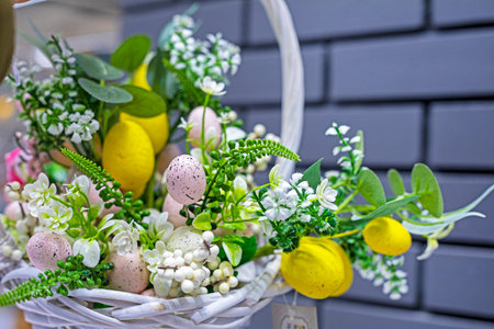 easter basket with eggs and decorative flowers. Easter holiday