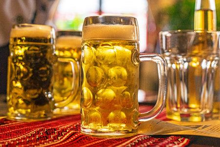 light cold beer in 0.33ml glasses in a cafe. Patrick's Day. Oktoberfest. beer dayの写真素材