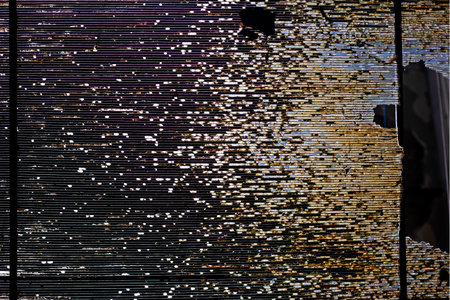 background of transparent roof covered with shrapnel and bullets. Conflict between countries