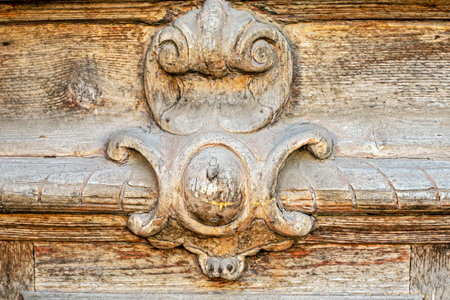 wooden vintage carved vignette on the doorの写真素材