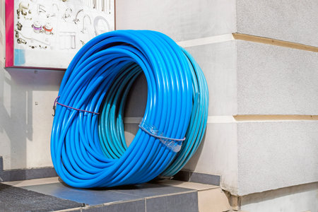 blue hose for water used in summer cottages, private houses and othersの写真素材