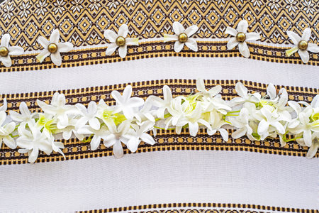 beautiful embroidered background of flowers, pearls and decorative pattern. national traditions