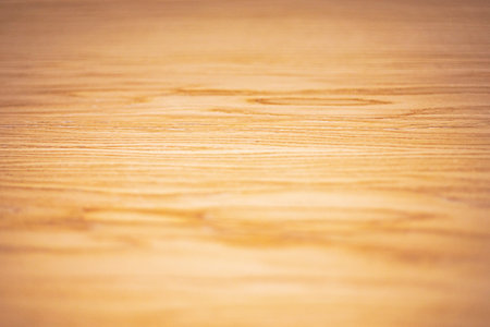 wooden natural maple surface with blurの写真素材