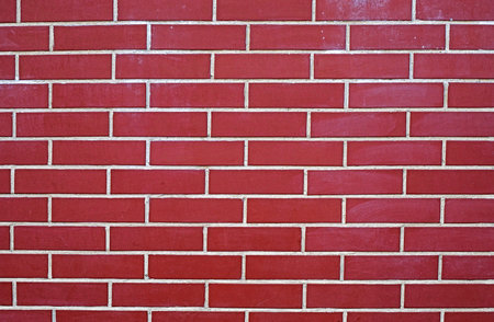 decorative red plaster surface imitating brickwork