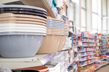 round plastic containers for flowers and household use cleaning in the supermarketの写真素材