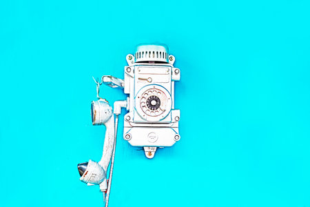 stylish old street retro telephone on blue background. father's day, grandfather's dayの写真素材